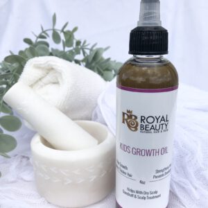 Product Hair Growth Oil with mortar and pestle