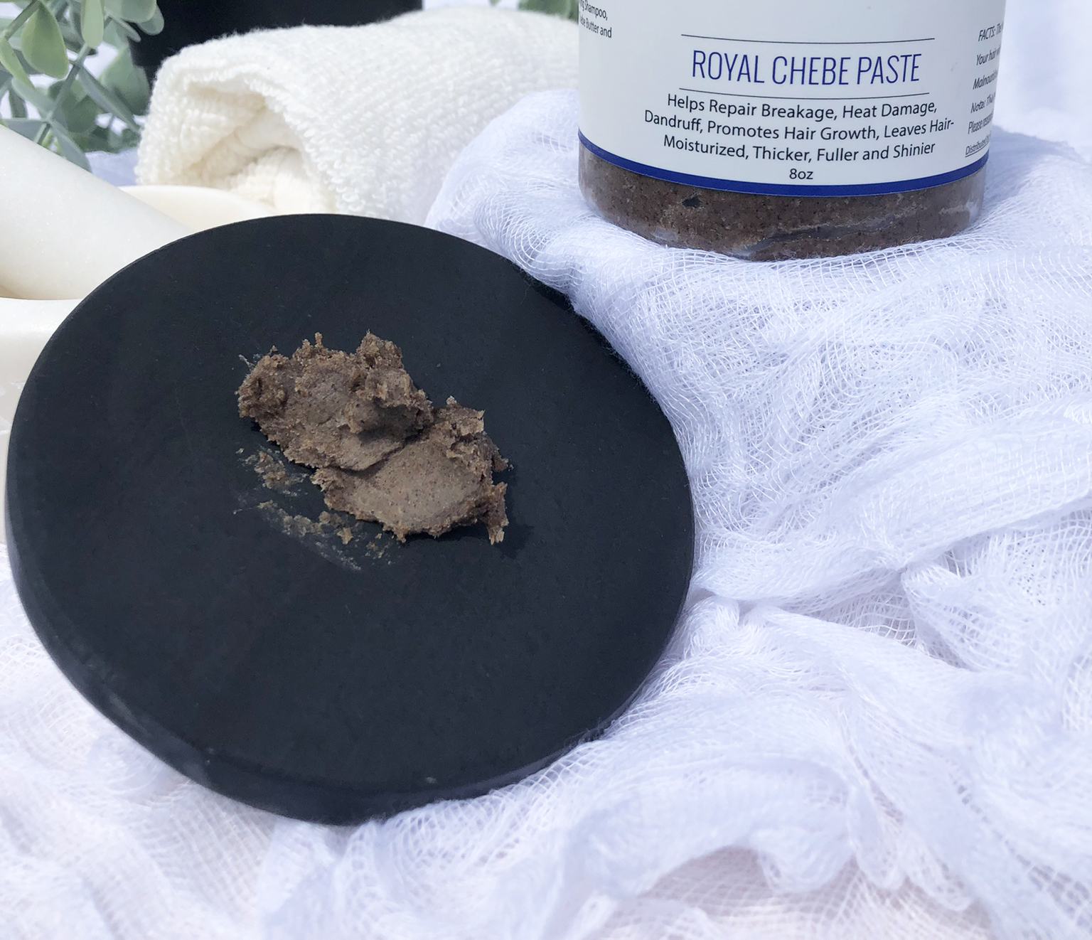 Smear of product on black disc