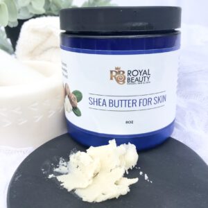 Shea Butter jar with product smear on black disc
